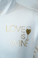 Plain White Hoodie with “Love is Wine” Pocket Print – Minimal & Trendy Style 🕊️